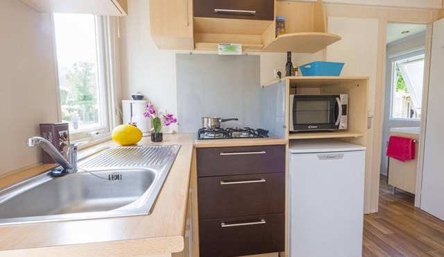 Cozy mobile home with terrace in Pezuls