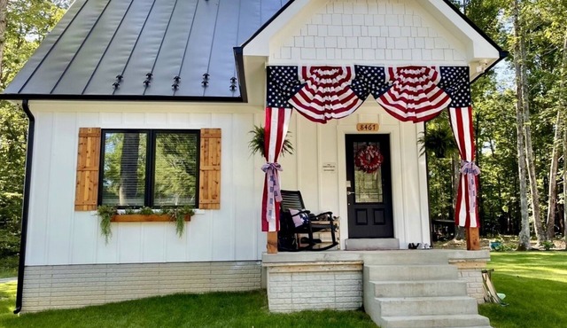 Cozy modern cottage on over 250 acres with 3/4 mile of Hazel river frontage!