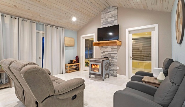 Cozy one level - open floor plan, split bedrooms, in-floor heat, wood stove