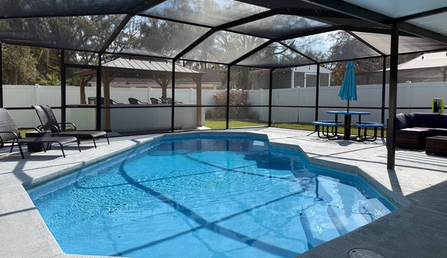 Cozy, Pet-Friendly Tampa Home with Heated & Screened Pool - 4 miles to Adventure Island/Busch Garden
