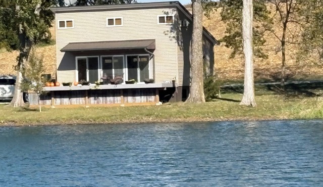 Cozy pond house nestled in nature waiting for you to enjoy