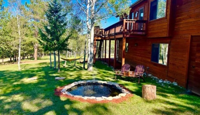 Cozy private mountain house on one acre. Private hot tub and pet friendly!