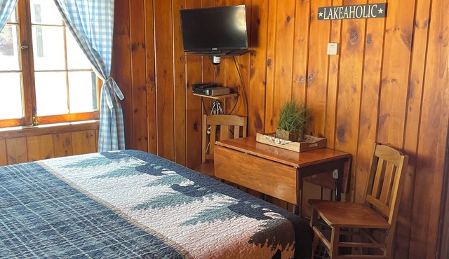 Cozy queen bed in main Resort Lodge