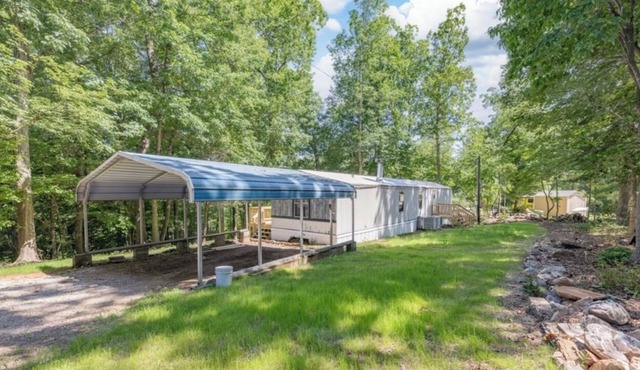 Cozy retreat waterfront on beautiful Lake Gaston with community pool.