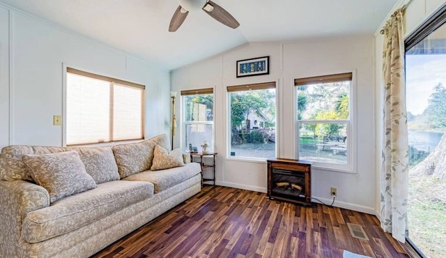Cozy Riverfront Cabin Near the Ocean with Deck, Grill, Electric Fireplace & WiFi