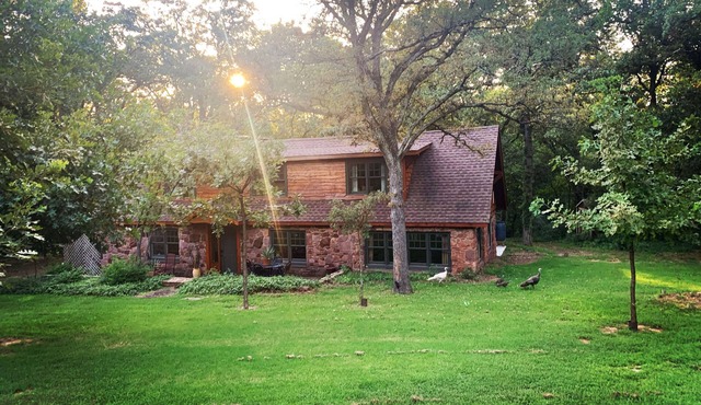 Cozy Route 66 Cabin with Hot Tub - The Gate House — a cozy, beautifully curated retreat in Edmond, OK.