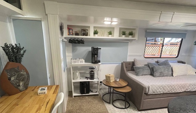 Cozy RV on working farm. 1 bedroom with queen size bed, 2 twin size beds.