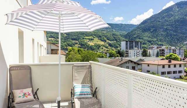 Cozy, Spacious condo with balcony and beautiful serene mountain views.
