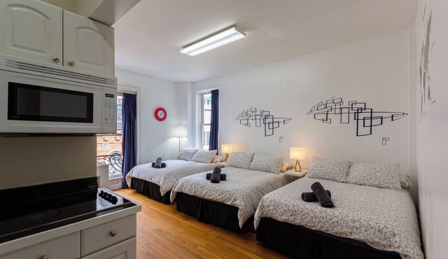 Cozy STUDIO 3 Full beds in Midtown 1