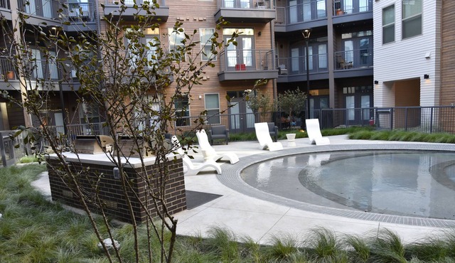 Cozy studio with a patio that opens up to cozy swimming pool.