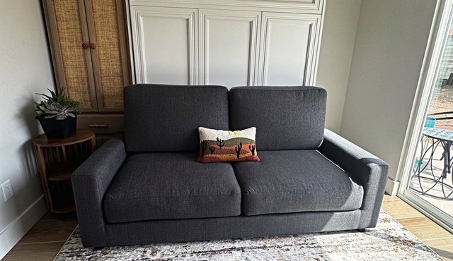 Cozy studio with modern kitchen in unit laundry and AC close to hiking trails.