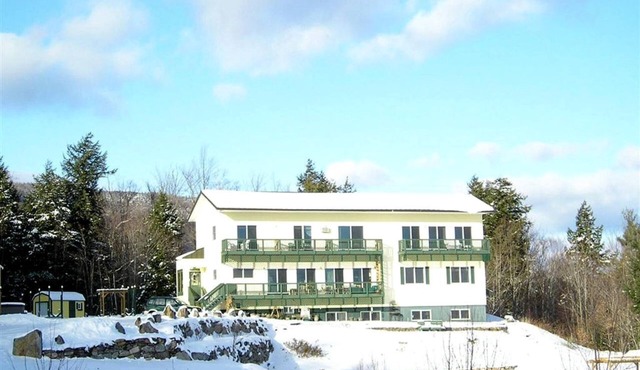 Cozy Suite Rental in a Bed and Breakfast with Fireplace and Magnificent Mountain Views near New Hampshire's Newfound Lake