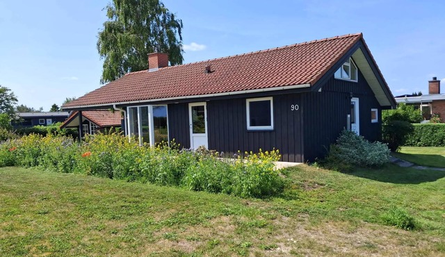 Cozy summer house by the beach and forest.