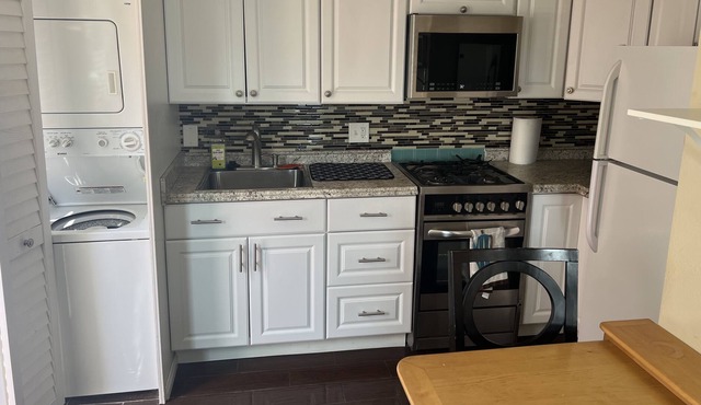 Cozy Sunset Beach Studio with Peek A Boo Ocean Views (Second Story/Dog Friendly)