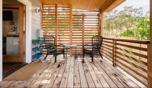 cozy tiny house, feed the farm animals, gaze at the stars from the hot tub