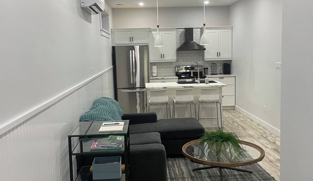 Cozy two-bedroom basement apartment equipped with a full kitchen! (Min 28 days)