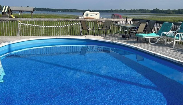 Cozy two bedroom cabin shores of Lake Nipissing. Enjoy the pool and lake views.