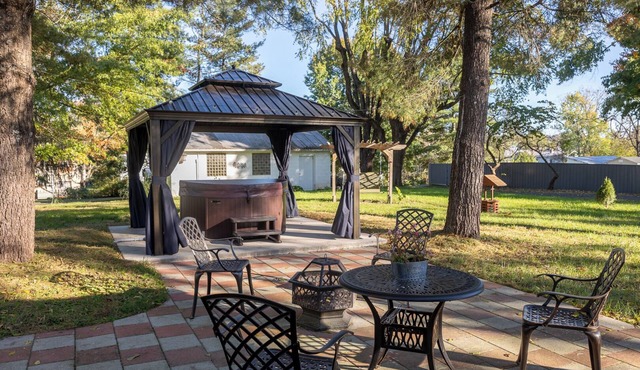 Cozy two bedroom home with hot tub, playroom and fire pit.