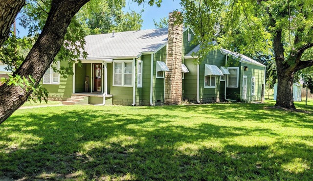 Cozy two-bedroom house with central heat and air. Close to downtown Ark City.