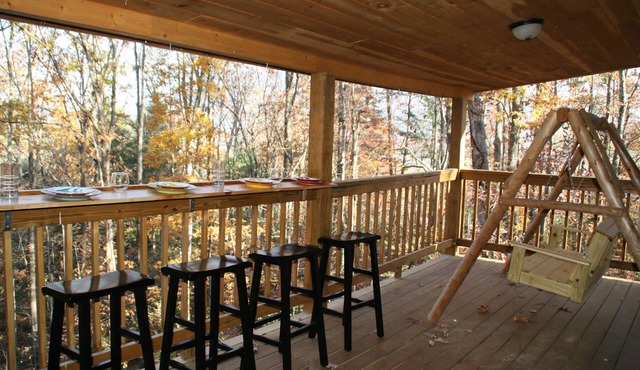 Cozy up by the fireplace in this Cabin in the Heart of Nature