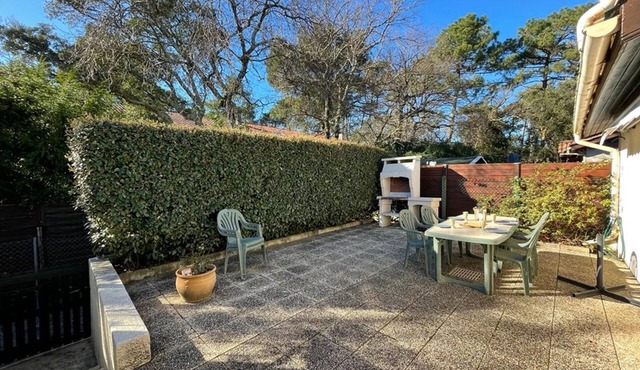 Cozy Villa Near Beach with Shared Pool, Patio, and Parking