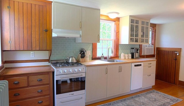 Cozy Village Cottage Within Walking Distance to the Beach and Downtown