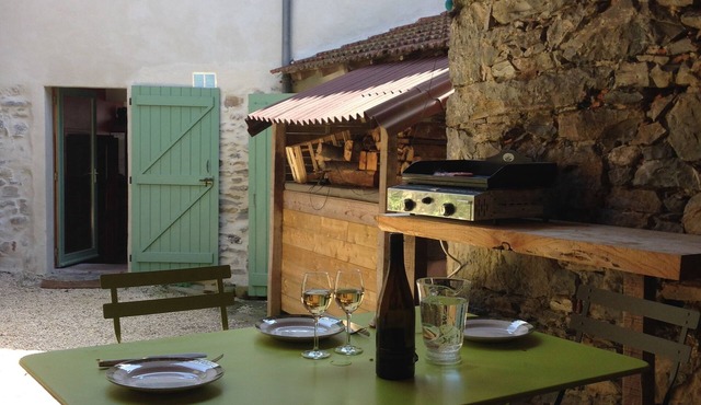 Cozy village house with terrace and garden, surrounded by greenery