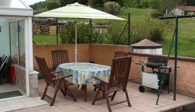 Cozy Village Retreat with Private Pond, Terrace, and Family Amenities in Le Ménil