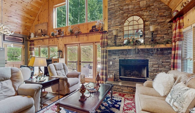 Cozy waterfront home w/hot tub, swing, firepit, and fireplace