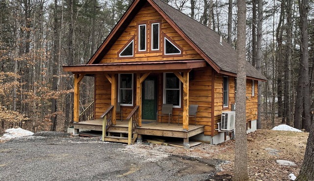 Cozy Woodland Cabin Living with Loft and Brookside Views