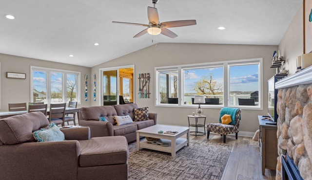 Cozy, year-round lake home with magnificent sunset views, lake access and dock.