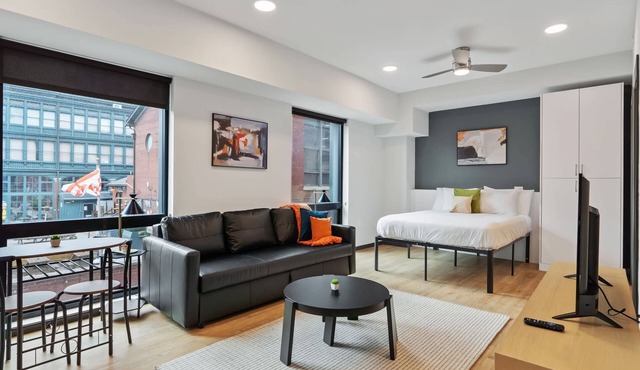 CozySuites Mass w/parking, lounge & roof deck #12