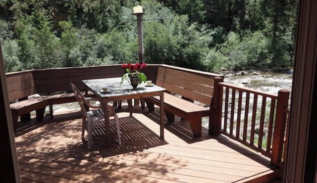 Create Memories at This Romantic Riverfront Cabin Near Estes Park