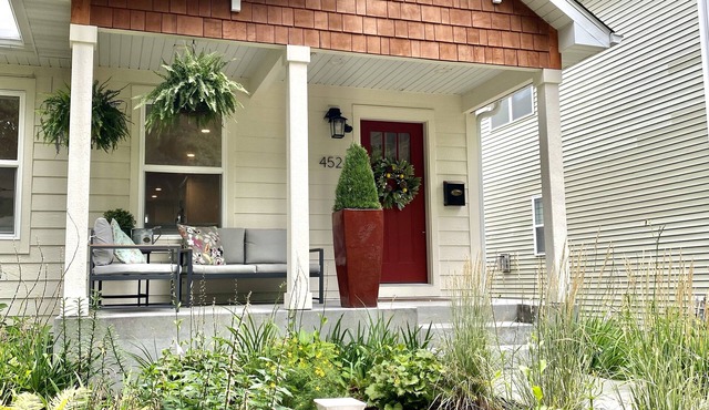 Creek half a block away! Family-sized, specious home with back patio and garden