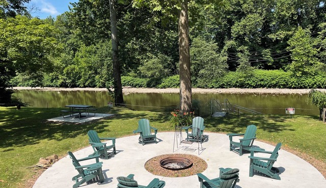 Creekfront getaway with hot tub and fire pit.