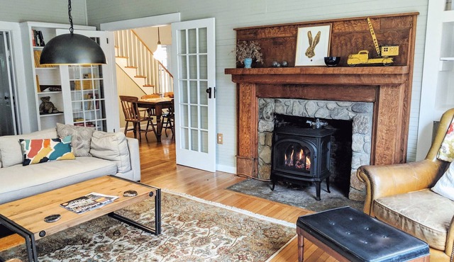Creekside Iconic Yellow Farmhouse with firepit