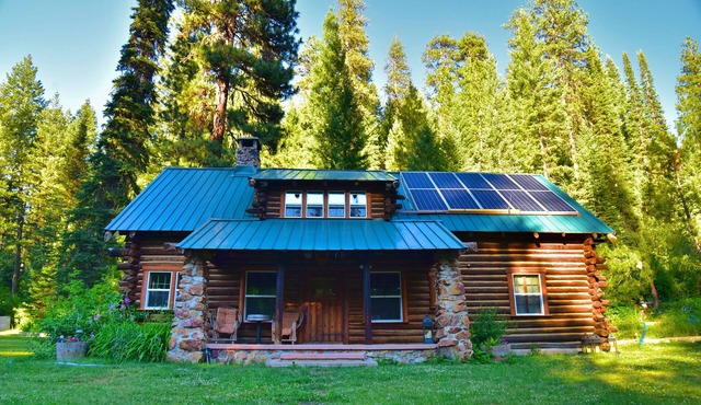 Creekside log cabin nestled between the pines of Idaho City