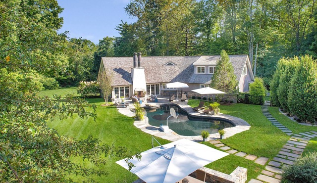 CT Retreat: Stunning, Expansive Compound with a Gorgeous Barn and Outdoor Pool