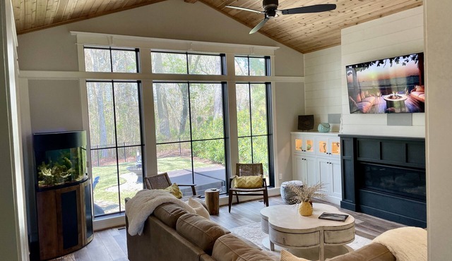 Custom 4-bedroom home w/boat slip, private fenced backyard & swimming pool.