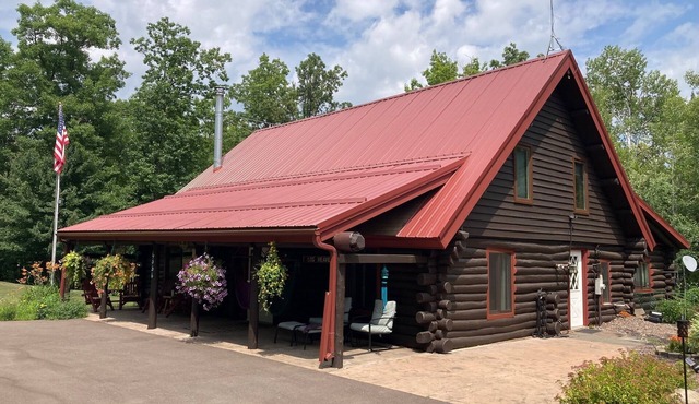 Custom built log home on 40 acres & in the woods!nSnowmobile right from home!