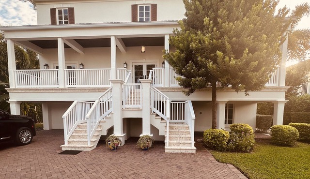 Custom Built Luxury Home on Canal; Walk to Beach; Close to Everything!