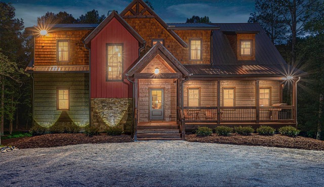 Custom built mountain house on trout stream with tons of privacy & hot tub.