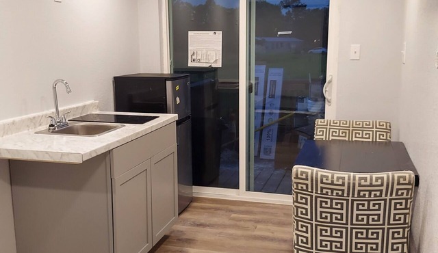 Custom Container Home w/ walk-in shower and patio! Walking distance to the river