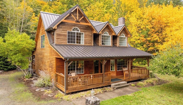 Custom Crafted Forest Retreat with Pond on 5 Acres