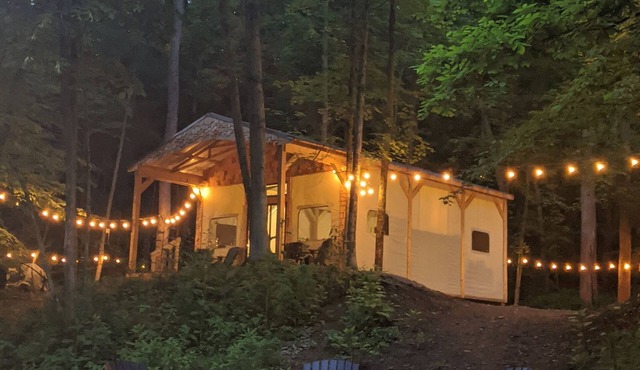 Custom design Safari Tent overlooking a serene running creek & natural waterfall
