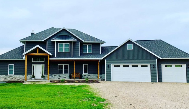 Custom New Home - Peaceful Setting only 15 min. from EAA!