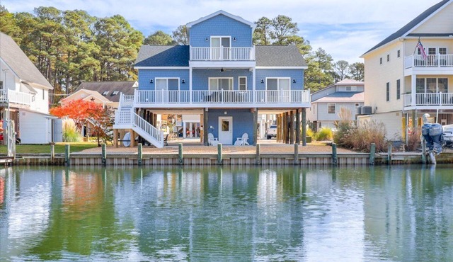 Custom waterfront home with elevator by Seaside Vacations & Sales