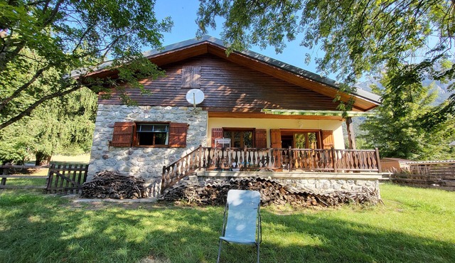 Cute chalet surrounded by trees