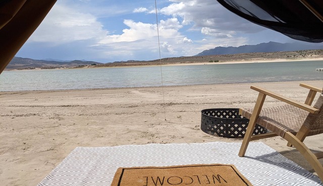 Cute glamping tent on private sandy beach