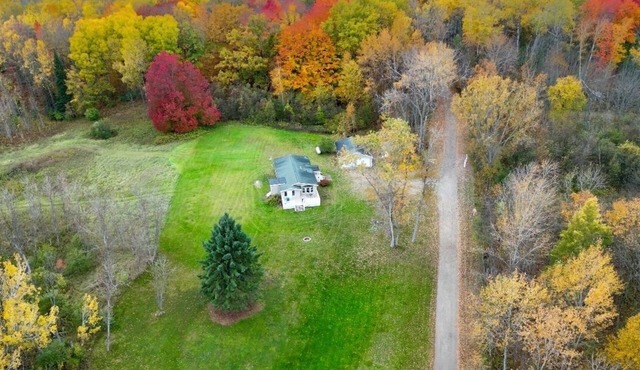 Cute Home on many acres with access to East Stylus Lake and ponds